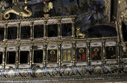 In this photo taken Thursday, Oct. 31, 2013, empty icon niches in the 19th-century church of St. George, where some 30 icons are missing, in the village of Lazaropole, near Debar, western Macedonia. Among the 30 icons stolen from the church in Lazaropole, high in the Macedonian massif, were 23 by the 19th-century Dico Zograf – one of the nation’s most famous painters. Zograf’s works can sell for tens of thousands of dollars on the black market.