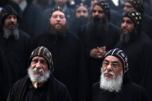 Clergymen gather to wait for the arrival of Egypt's Coptic Christian Pope Tawadros II, at the historic al-Muharraq Monastery, a centuries-old site some 180 miles (300 kilometers) south of Cairo in the province of Assiut, Egypt, on Feb. 5, 2013. (Khalil Hamra/AP)