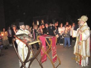 Metropolitan Elpidophoros Lambriniadis (R) leads the night ritual during the Easter celebrations held on the Heybeliada Island, close to Istanbul.