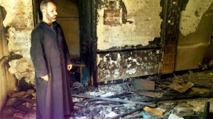 Father Ayoub Youssef said Muslim neighbours helped him escape during the attack on his church 