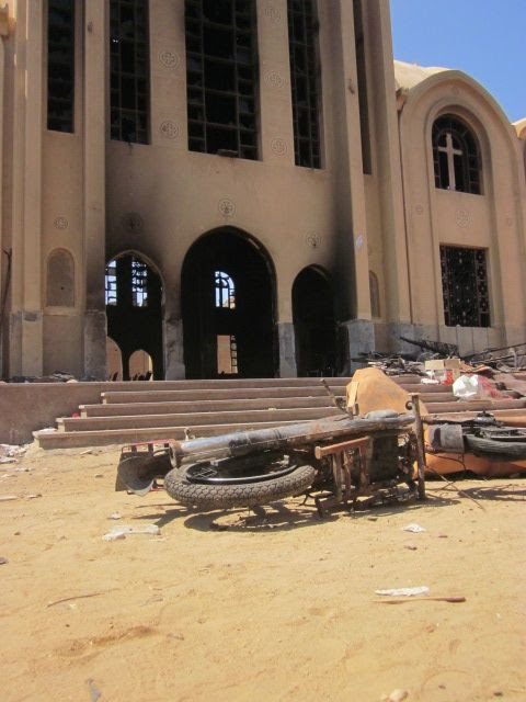 كنيسة العذراء بقرية المنزلة بمحافظة الفيوم بعد حرقها
