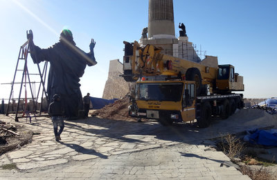 Workers prepare to install a statue of Jesus on Mount Sednaya, Syria. 