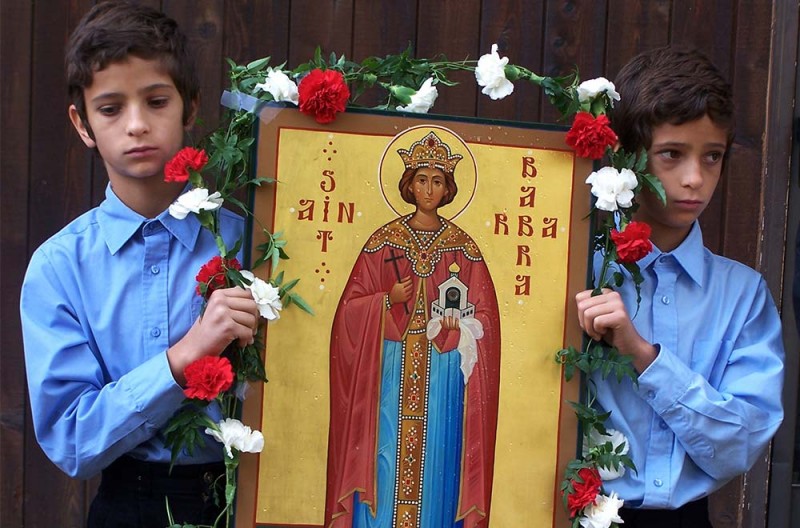 Pleased to meet me: With ecumenical fanfare, Saint Barbara's icon makes its debut with the relic in this photo from 1996. (Courtesy of St. Barbara Orthodox Monastery)