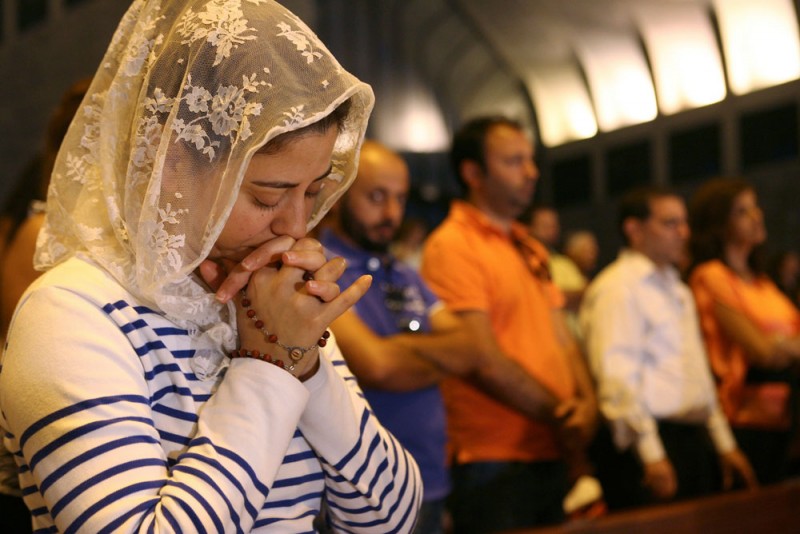 Lebanese and Syrian Christian Maronites pray for peace in Syria, in Harisa, Jounieh September 7, 2013. PHOTO: REUTERS/HASAN SHAABAN