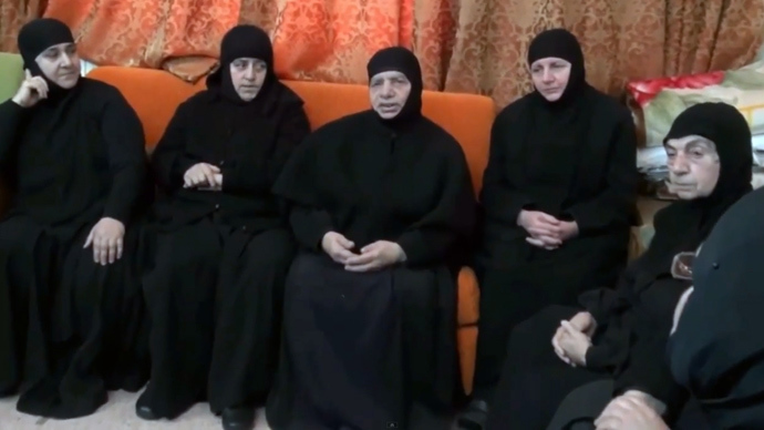 An image grab taken from a video uploaded to YouTube on February 9, 2014, shows a group of nuns from the historic Christian-majority town of Maalula, speaking to the camera from an undisclosed location (AFP Photo)