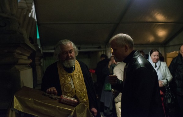 Confession outside: the pilgrims prepare for the Liturgy on the following day