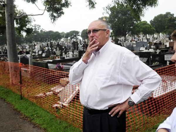 Ian McIntosh, CEO of the Rookwood Necropolis Trust, inspects the damage. Picture: Phillip Rogers