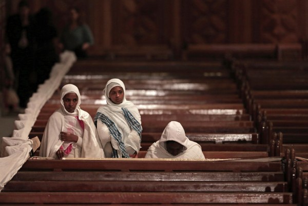 Ethiopian Christian women pray during the Easter Eve service at St. Mark's Cathedral, in Cairo, Egypt. April 11, 2015.