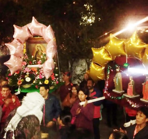 Street procession honoring the Magi pauses in front of the Cathedral of the Ascension. 