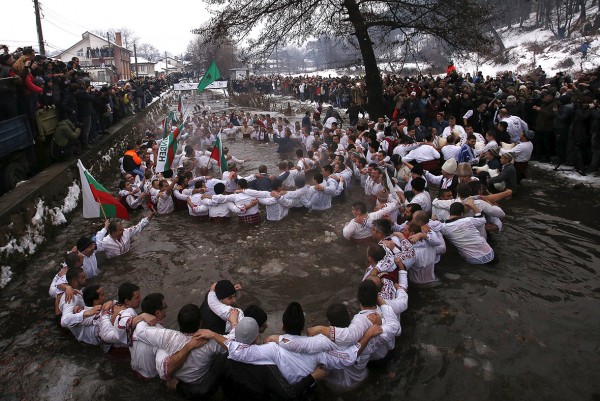 Bulgarian men dance in the icy waters of the Tundzha river during a celebration for Epiphany Day in the town of Kalofer Stoyan Nenov/Reuters