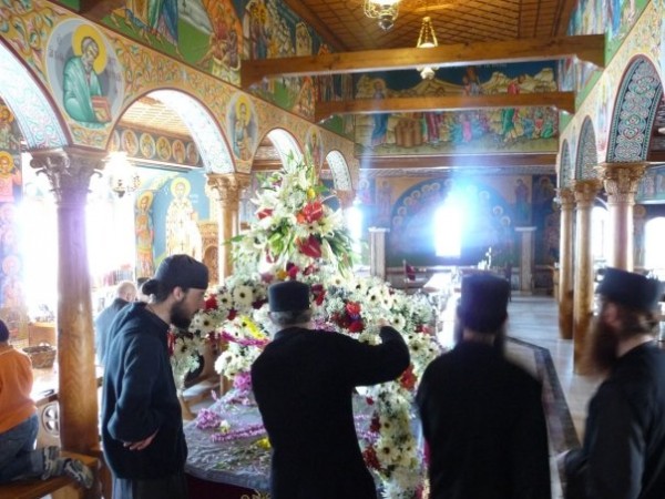 Monks decorating the tomb on Holy Friday in the monastery's dining hall