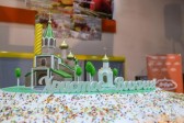Diocese stands a 1.5 meter Easter cake decorated with a copy of the cathedral for Yakutsk residents to treat