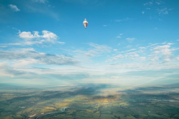 The balloon of Russian adventurer Fedor Konyukhov appears in the distance (Oscar Konyukhov/ Reuters)