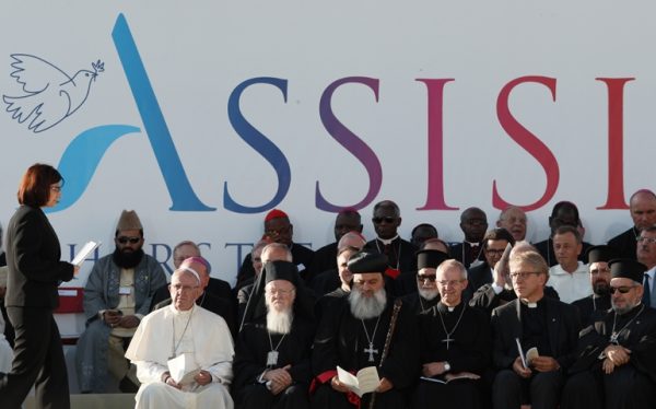 No war is holy, pope says at interreligious peace gathering