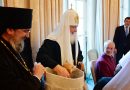 Parishioners of the Russian cathedral in London present a puppy to Patriarch Kirill