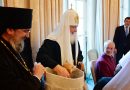 Parishioners of the Russian cathedral in London present a puppy to Patriarch Kirill