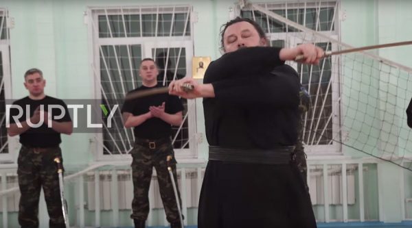 Divine power: Orthodox priest shows off impressive swordplay (VIDEO)