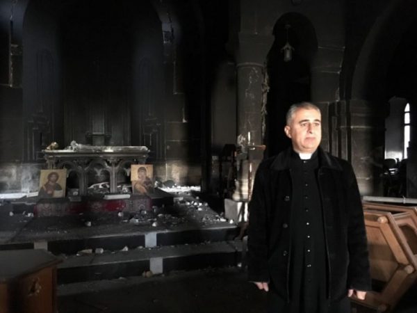 Father Benham in his church in Bartella. Samaritan's Purse