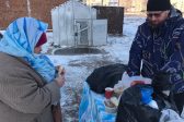 Priest Feeds the Homeless in Ishimbay